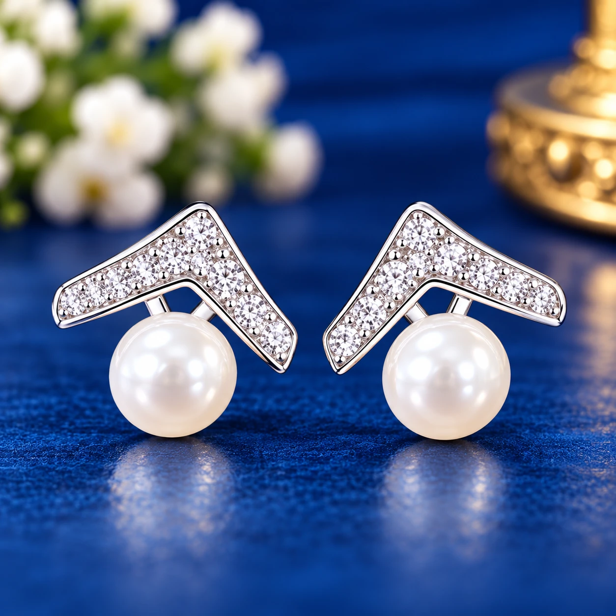 geometric shape combined with the classic pearl silver earrings