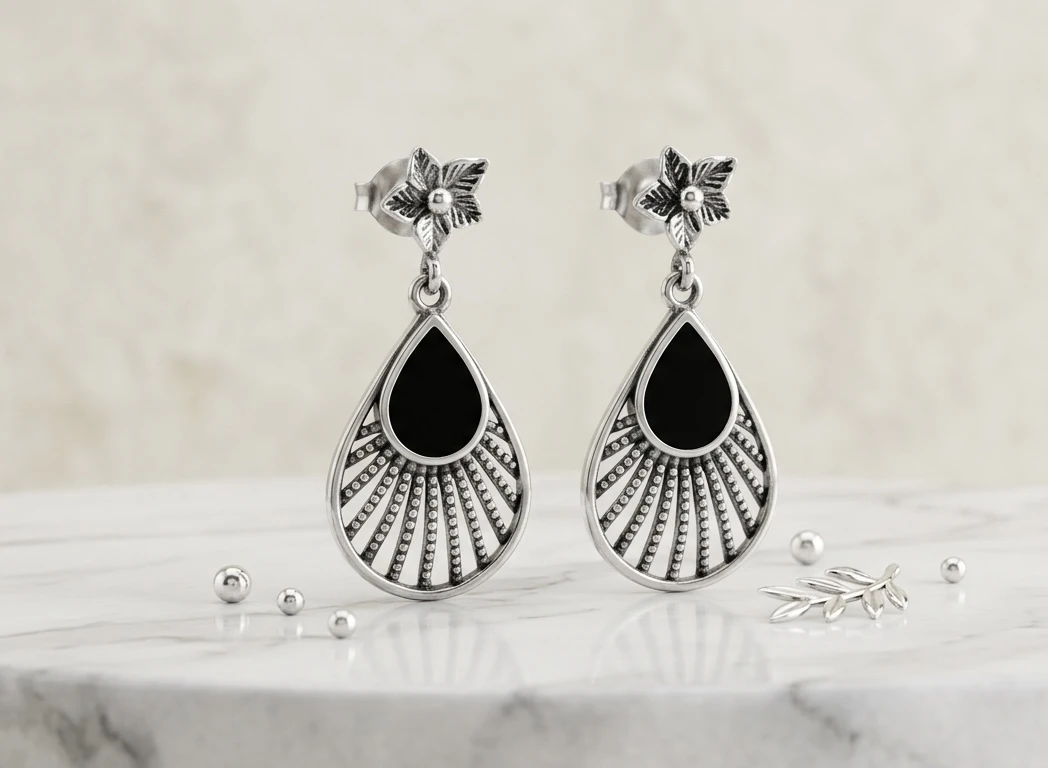 floral top and black enamel/onyx-oxidized teardrop silver earrings