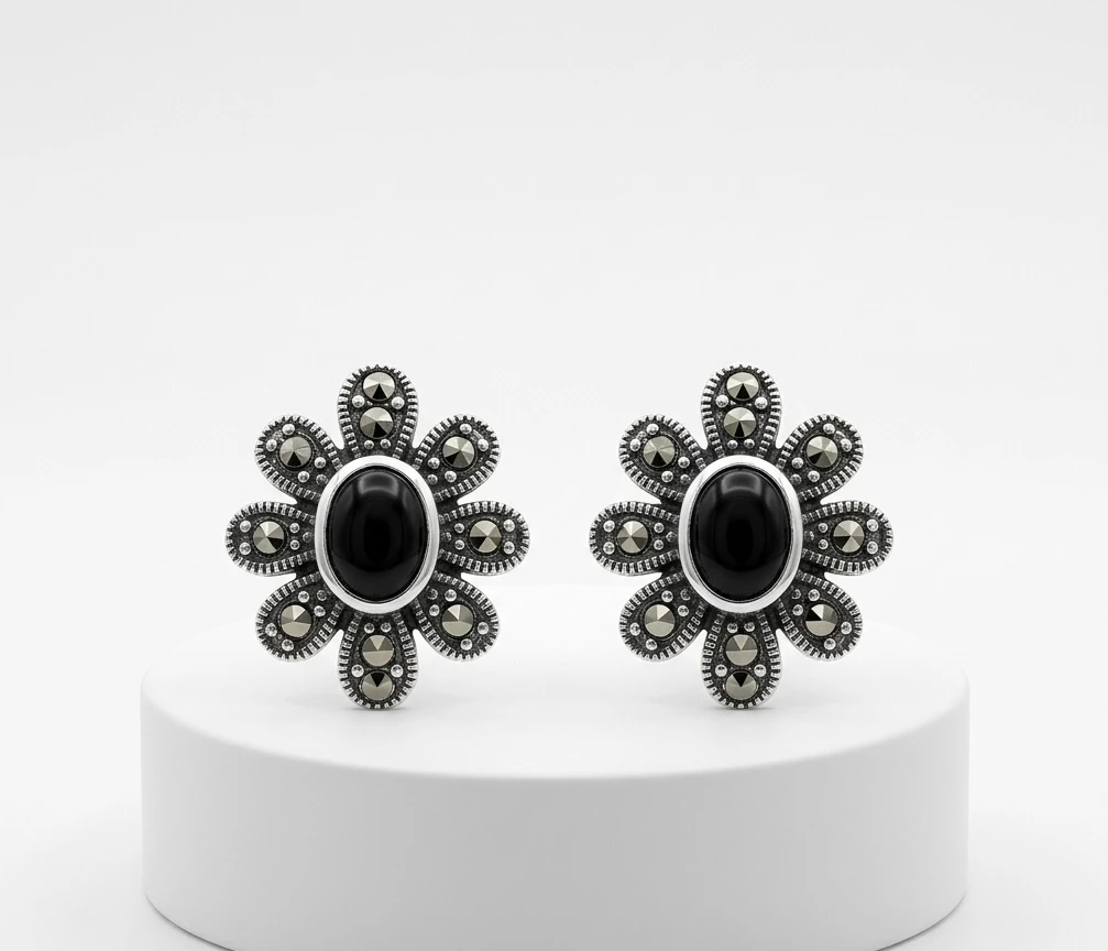 vintage marcasite petals and a black oval stone silver earrings