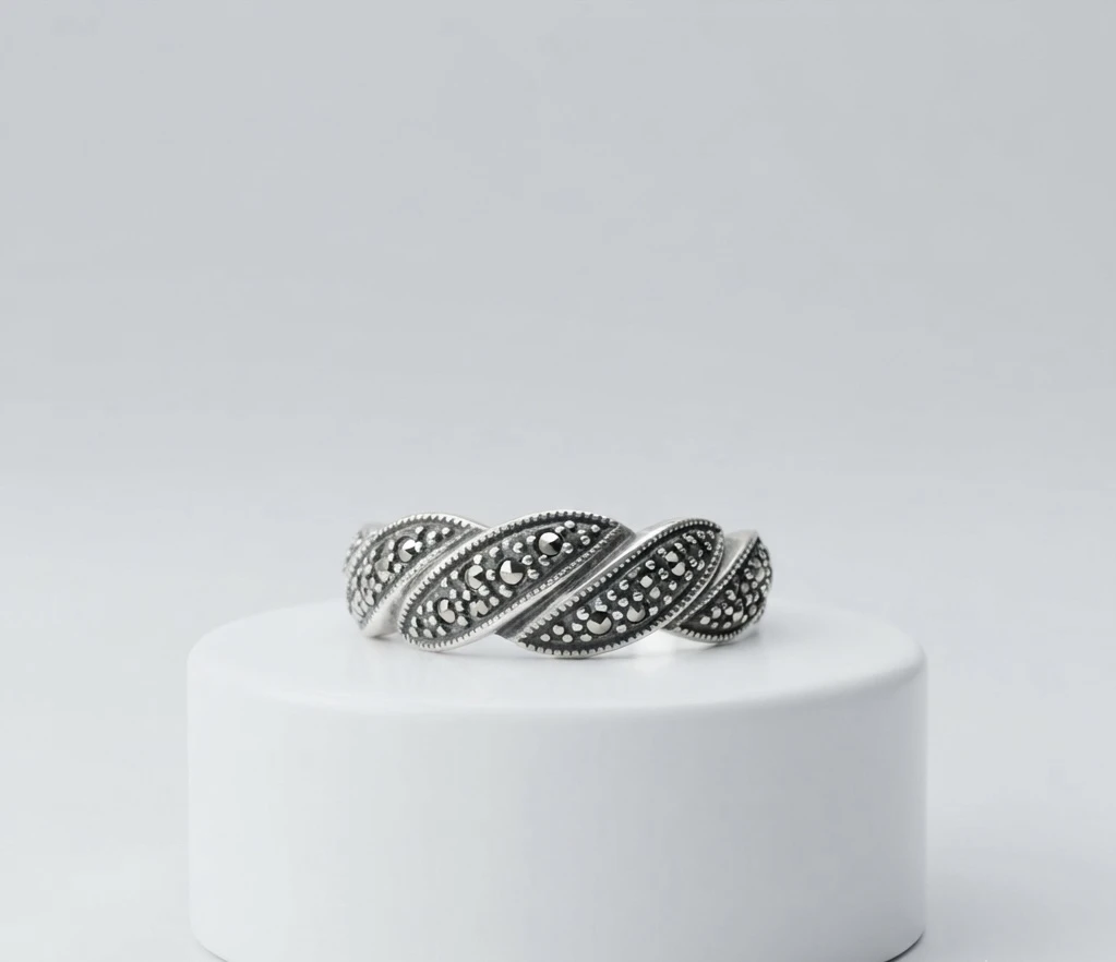 vintage marcasite detailing with an antique twisted pattern silver ring
