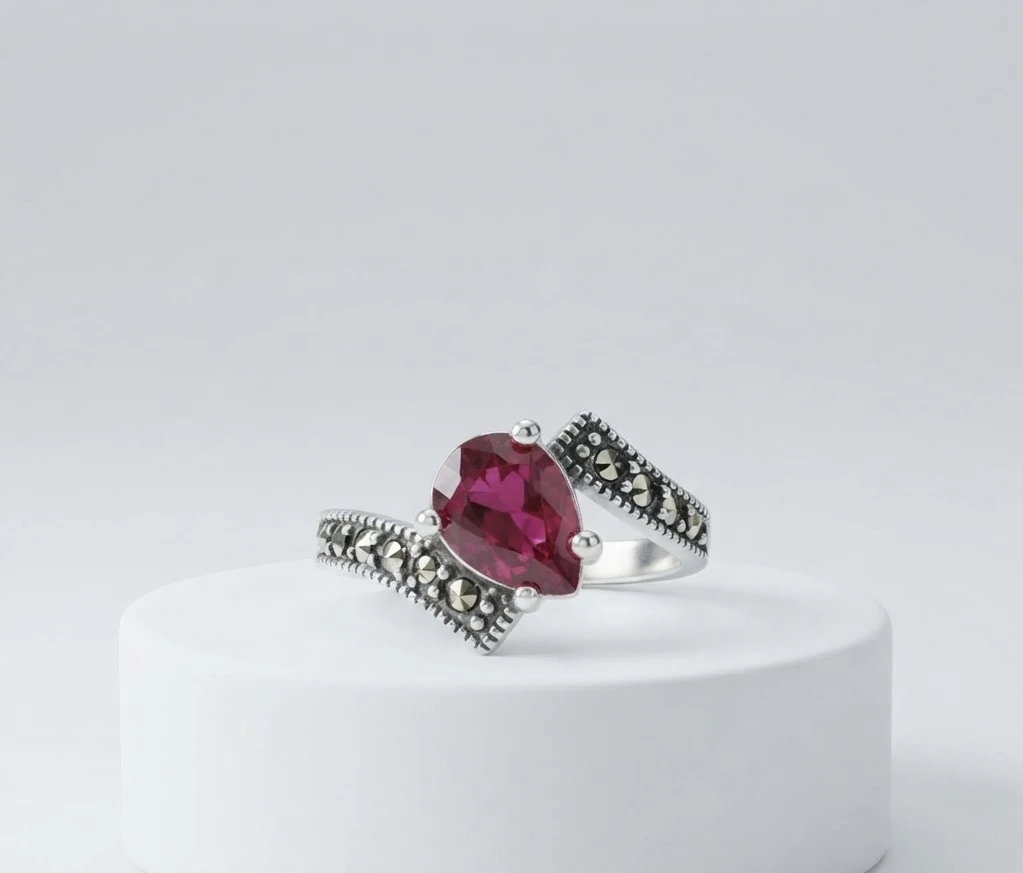 ruby gemstone accented with sparkling antique marcasite stones silver ring